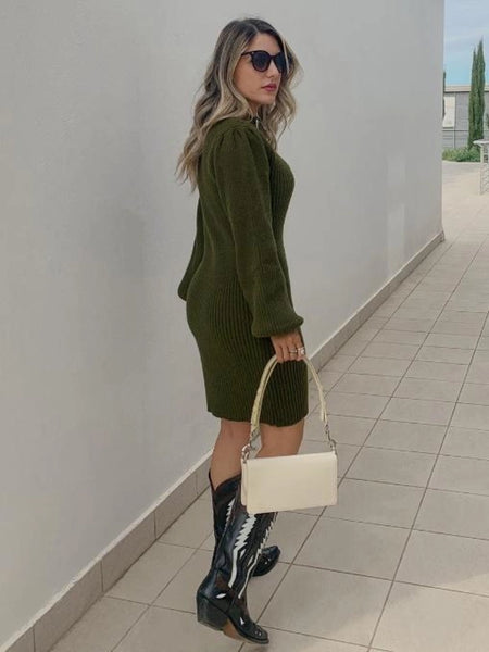 Woman in chic sweater dress