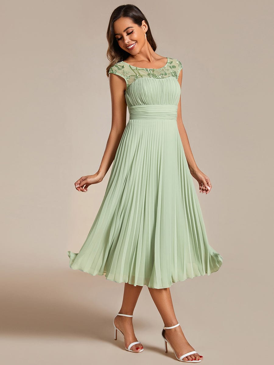 A-Line Pleated Chiffon Wedding Guest Dress with Round Neckline and Cap Sleeves