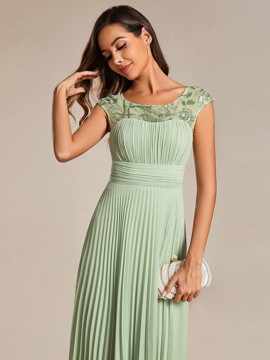 A-Line Pleated Chiffon Wedding Guest Dress with Round Neckline and Cap Sleeves