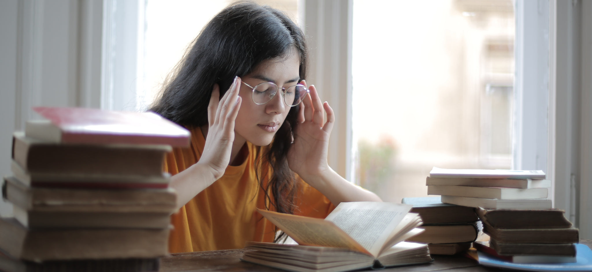 A woman suffers from headache