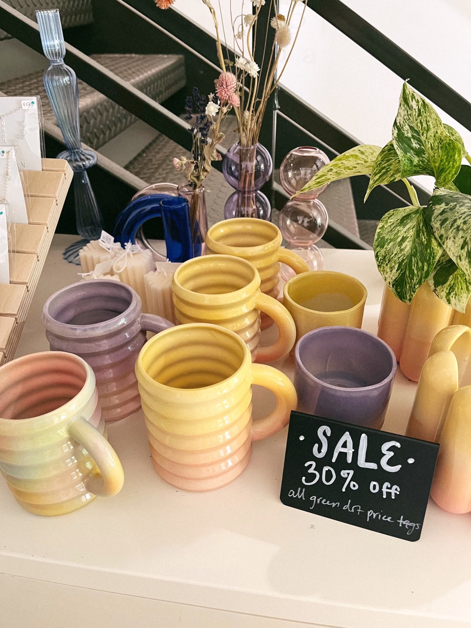 Sale on mugs, candles, and jewelry