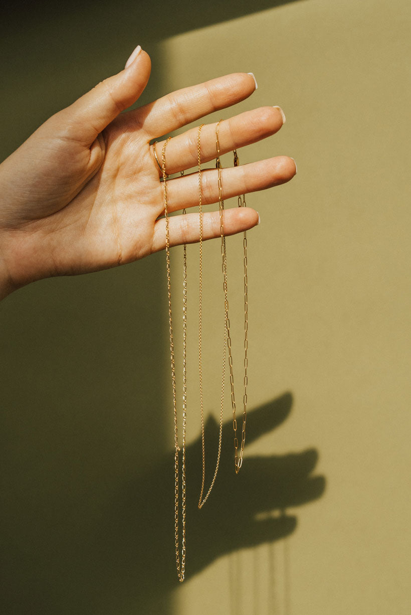 Solid yellow gold necklaces for layering