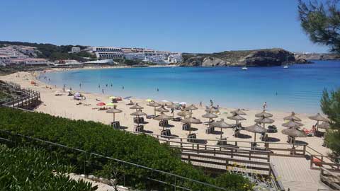 the sandy beach in minorca Spain