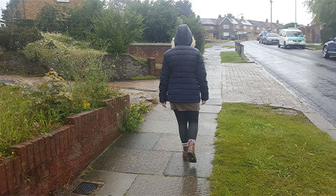 walking in the rain to keep sustainable