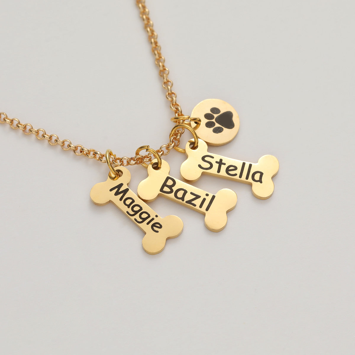 gold dog bone necklace