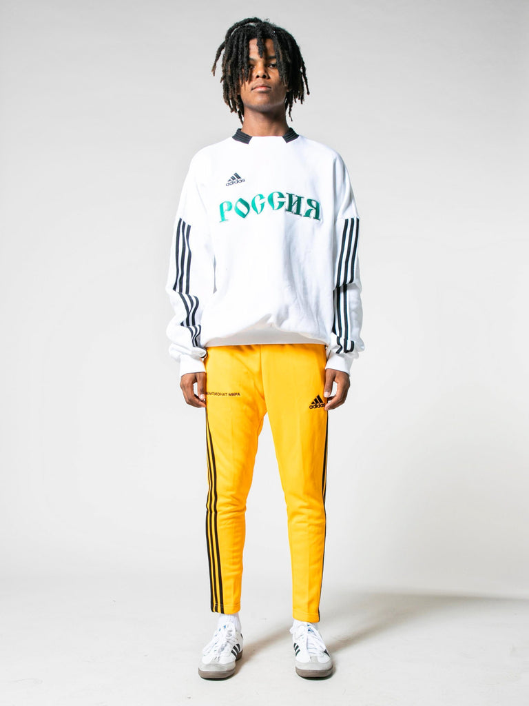 yellow adidas track pants