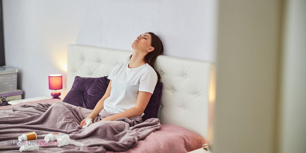 woman leaning on headboard