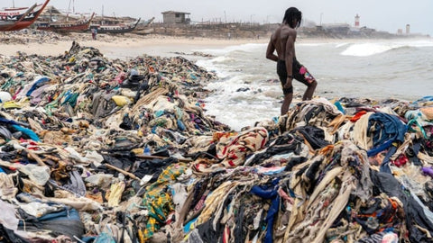 ‘Faux leather is harmful during production and disposal’ … clothing on a beach in Ghana.
