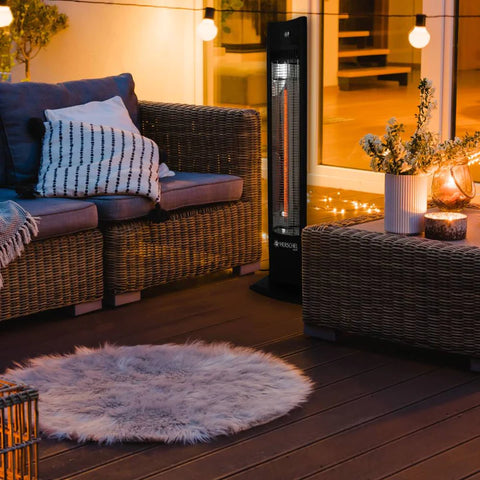 Outdoor patio heater beside furniture
