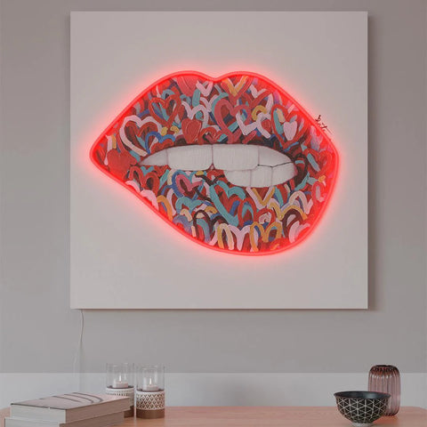 LED wall art of a lip biting mouth