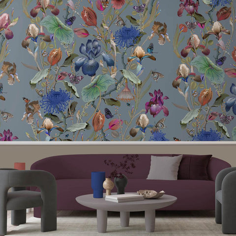 large floral and foliage wallpaper in muted bright colours
