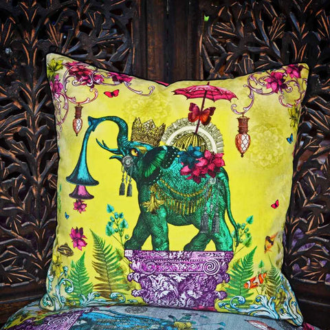 Cushion with a green Asian elephant decorated in an oriental style
