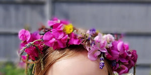 Pink flower crown on child's head