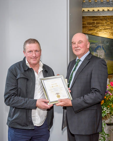 David Boyers receives long service award from Jimmy Dickinson