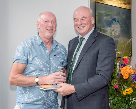 David Hinchliffe receives long service and retirement award from Jimmy Dickinson