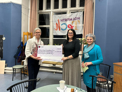 Sian Taylor of HVCAP receives cheque from Greta Bradley and Emma Woods-Bolger