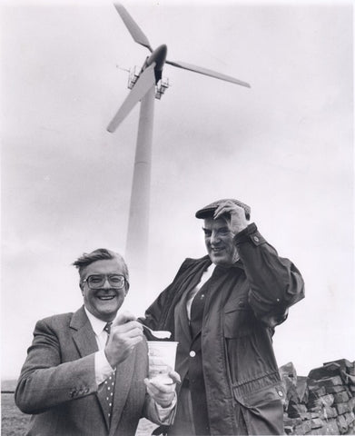 Kenneth Baker and Joseph Dickinson in front of the Longley Farm wind turbine 1990