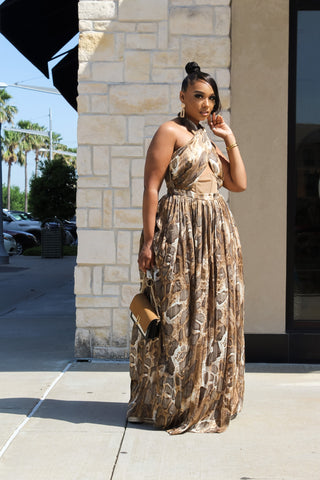 woman wearing brown dress posing for photo