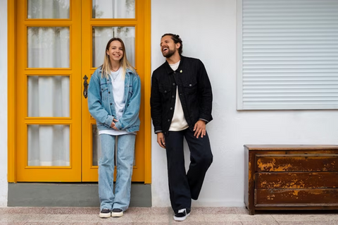 a couple posing for a picture showing Gender-Neutral Fashion