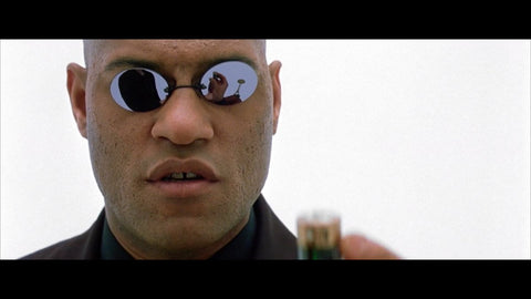 Morpheus from The Matrix wearing Pince-Nez style sunglasses with a black mirror lens. 
