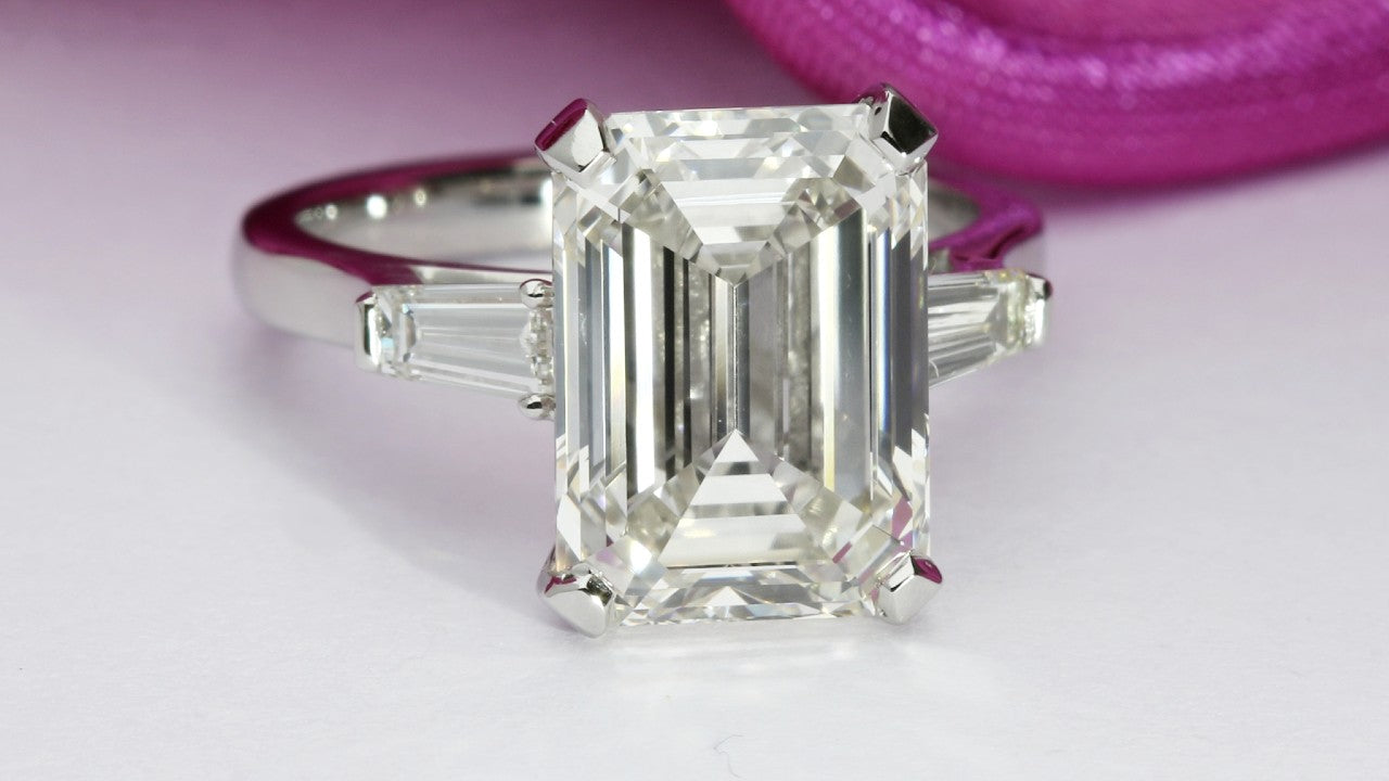 Tapered baguette emerald cut engagement ring