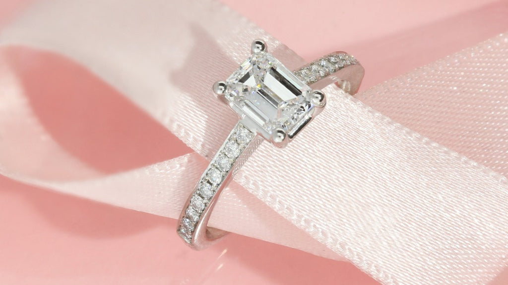 Pave emerald cut engagement ring