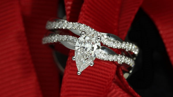 pear diamond twist bridal set 