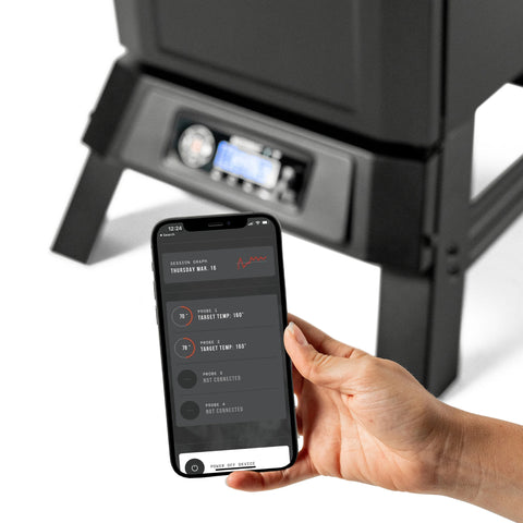 A hand holds a smartphone running the Masterbuilt app. The app displays data from 2 meat probes and a graph of the temperature history.