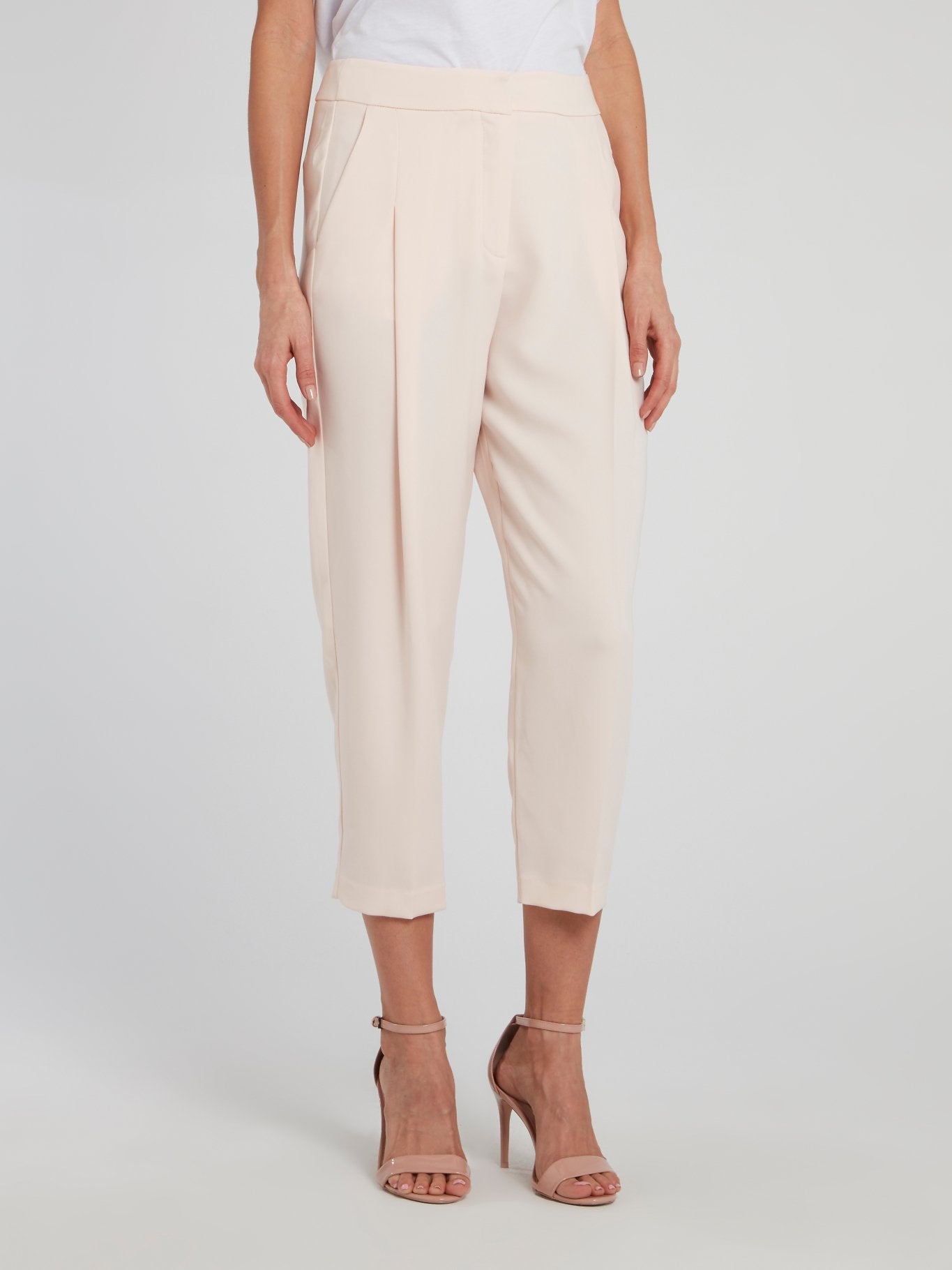 beige tapered trousers