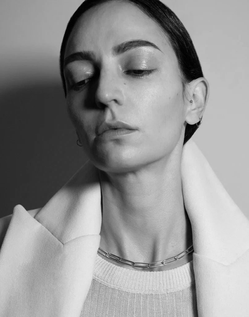 Ilenia Toma wearing Kinraden Exhaling Her recycled sterling silver and 18k gold necklace