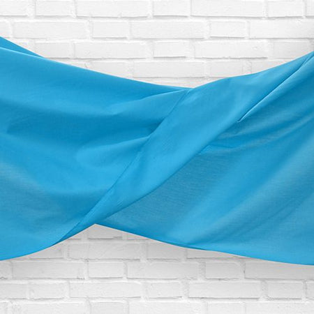 Click to view product details and reviews for Light Blue Fabric Drapes 11m Wide Per Metre.