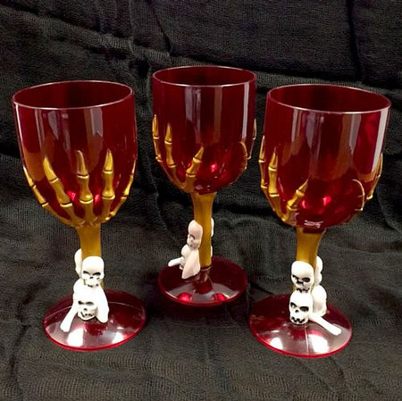 Click to view product details and reviews for Plastic Skeleton Hand Goblet 9ozs.