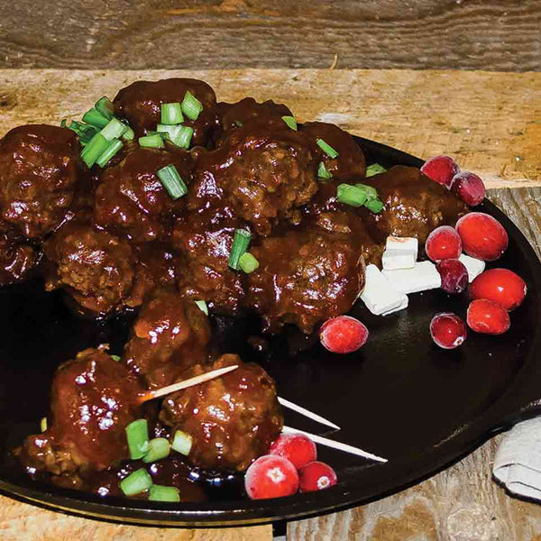 A closeup of the cranberry chili meatballs cooked in a crock pot by Felton Angus Beef.