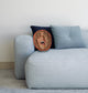 face cushion on the sofa with cushions and pillows. women photo on cushion.