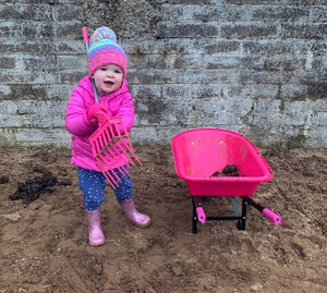 kids pink wheelbarrow