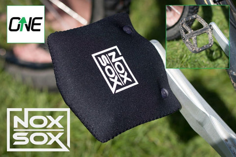 OneUp pedal and a large Nox Sox pedal cover
