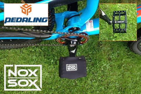 Pedaling Innovations Catalyst pedals with a large Nox Sox padal cover