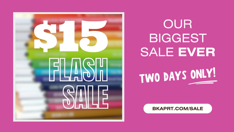 Bright pink background with a blurred photo of colorful paperback books. White text reads $15 Flash Sale. Our biggest sale ever, two days only!