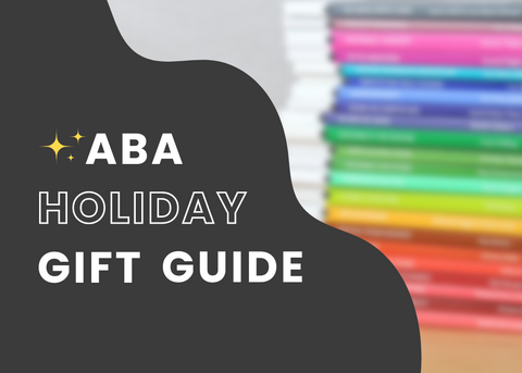Blurred image of a stack of colorful books with words overlayed. They read ABA Holiday Gift Guide.