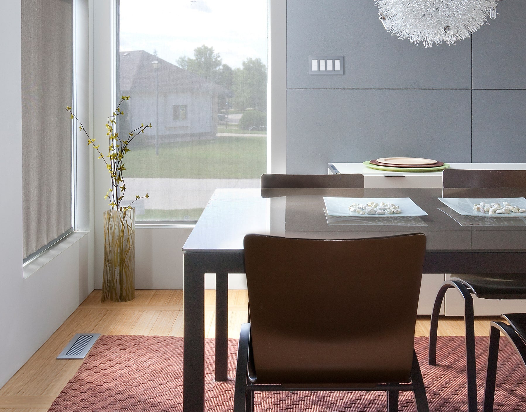 brushed chrome vent cover and stainless steel switch plate in modern dining room by kul grilles min