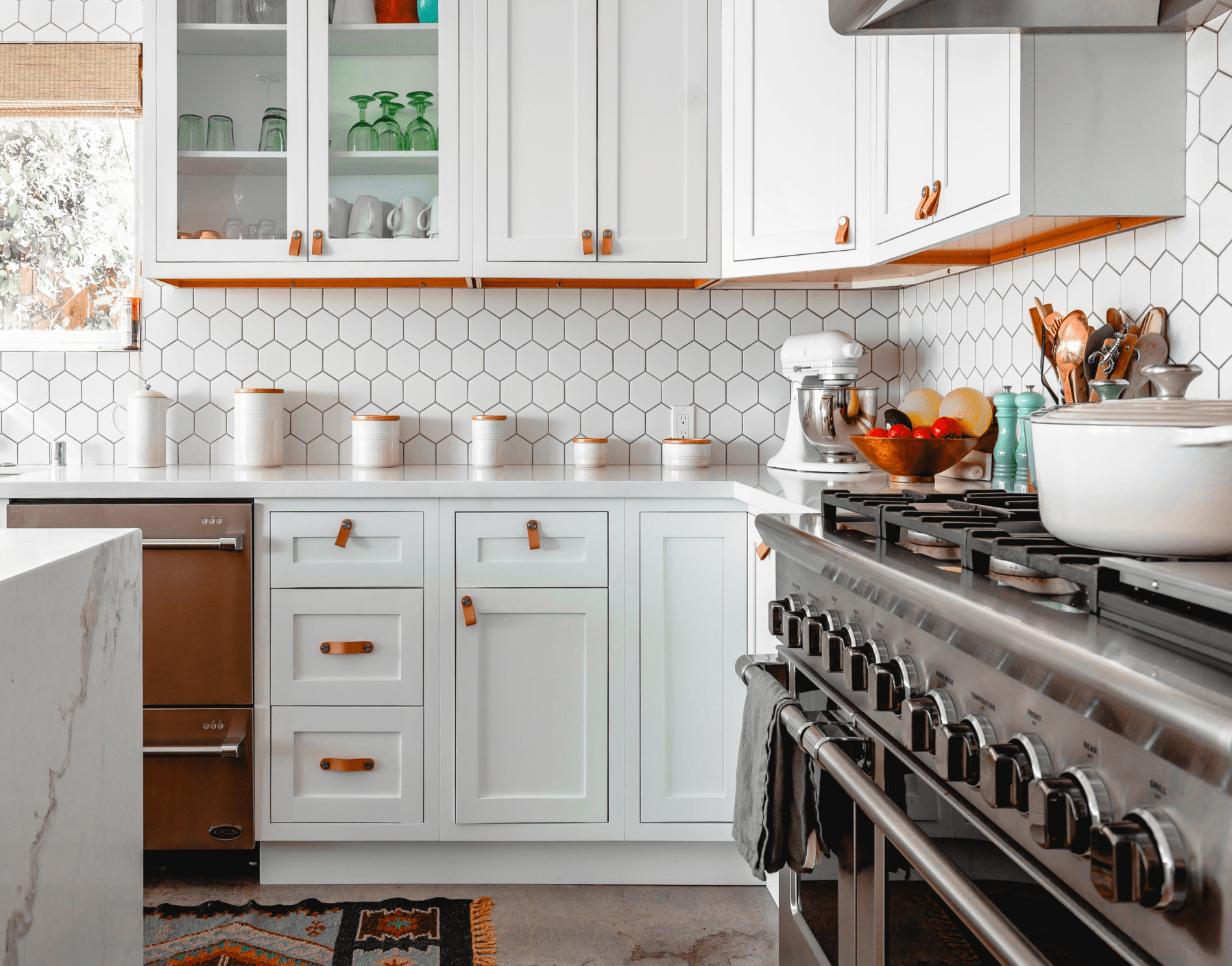 contemporary kitchen with honeycomb backsplash and white cabinetry min