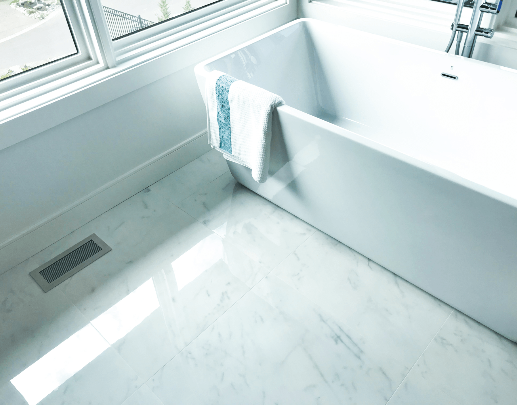 kul grilles anodized clear vent cover in contemporary luxury bathroom