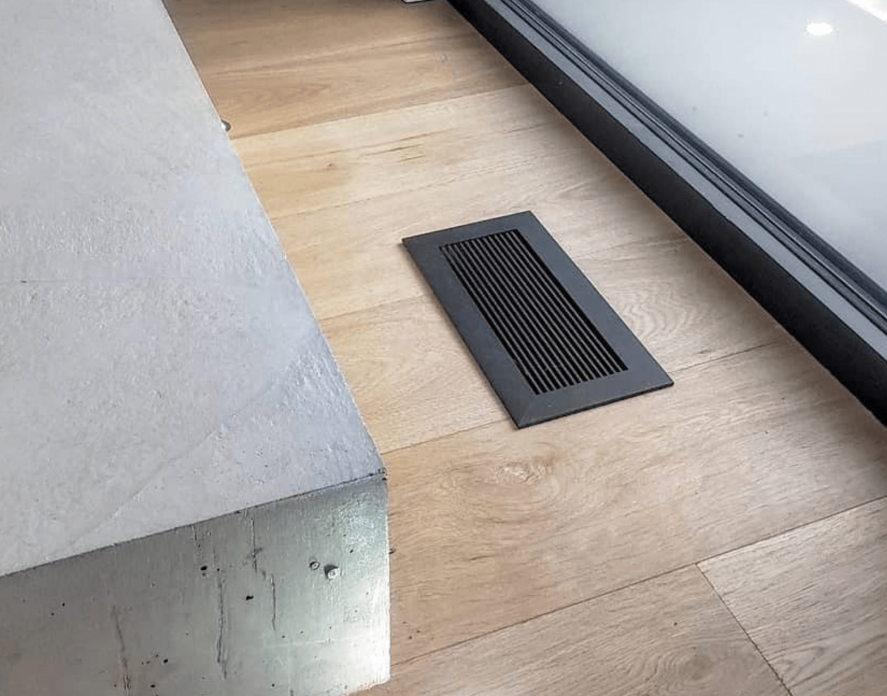 kul grilles black monolith vent cover on hardwood