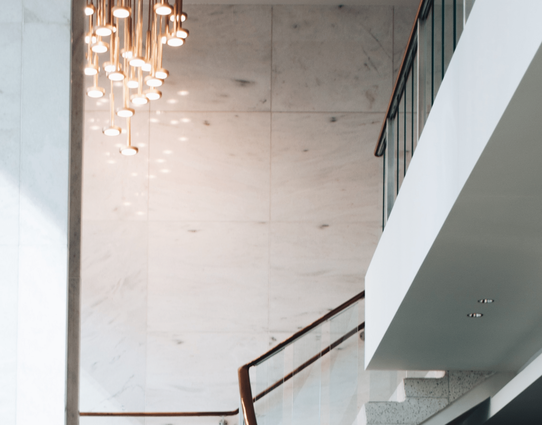 statement lighting in luxury stairway