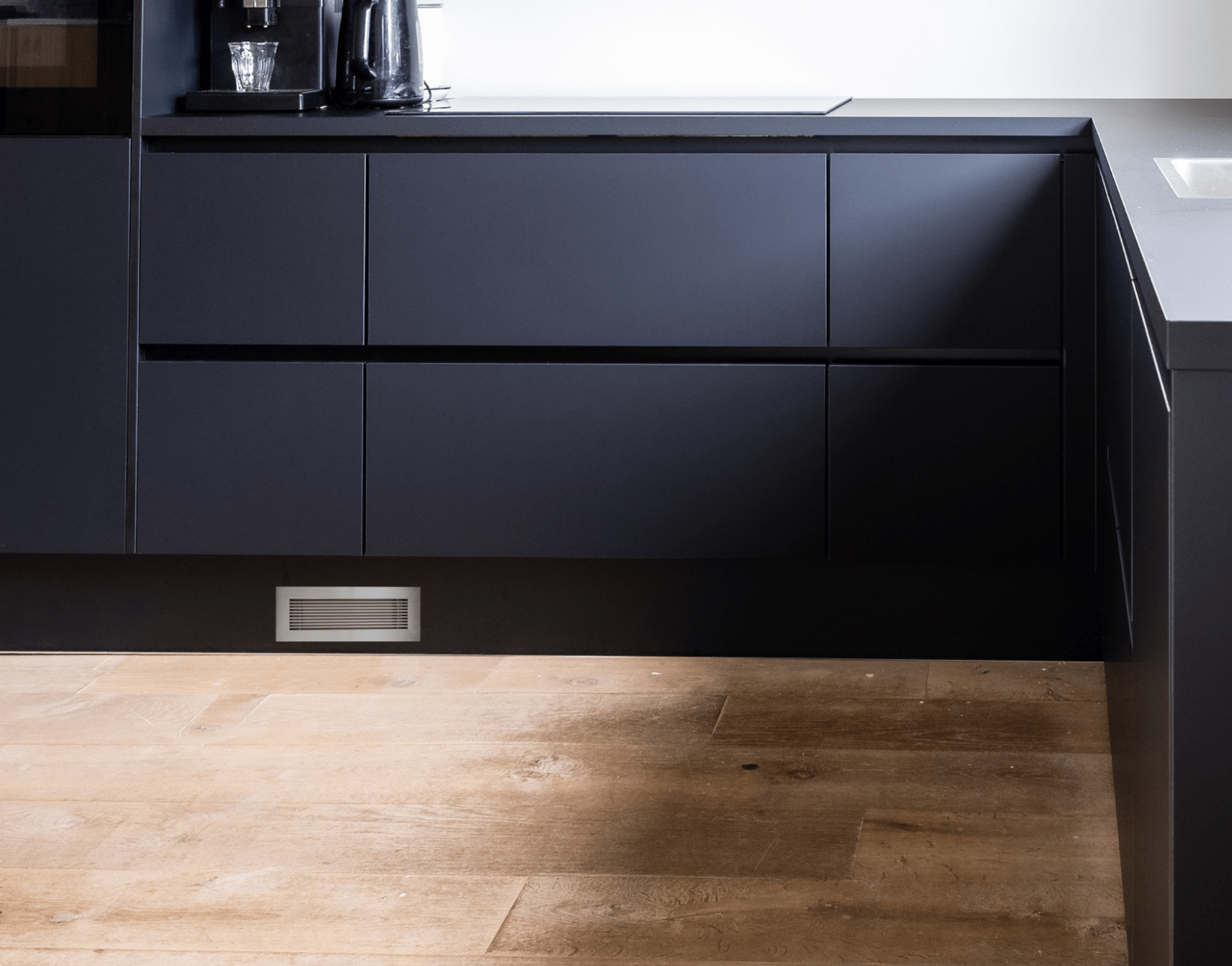 vent covers brushed chrome toekick modern dark grey kitchen cupboards by kul grilles