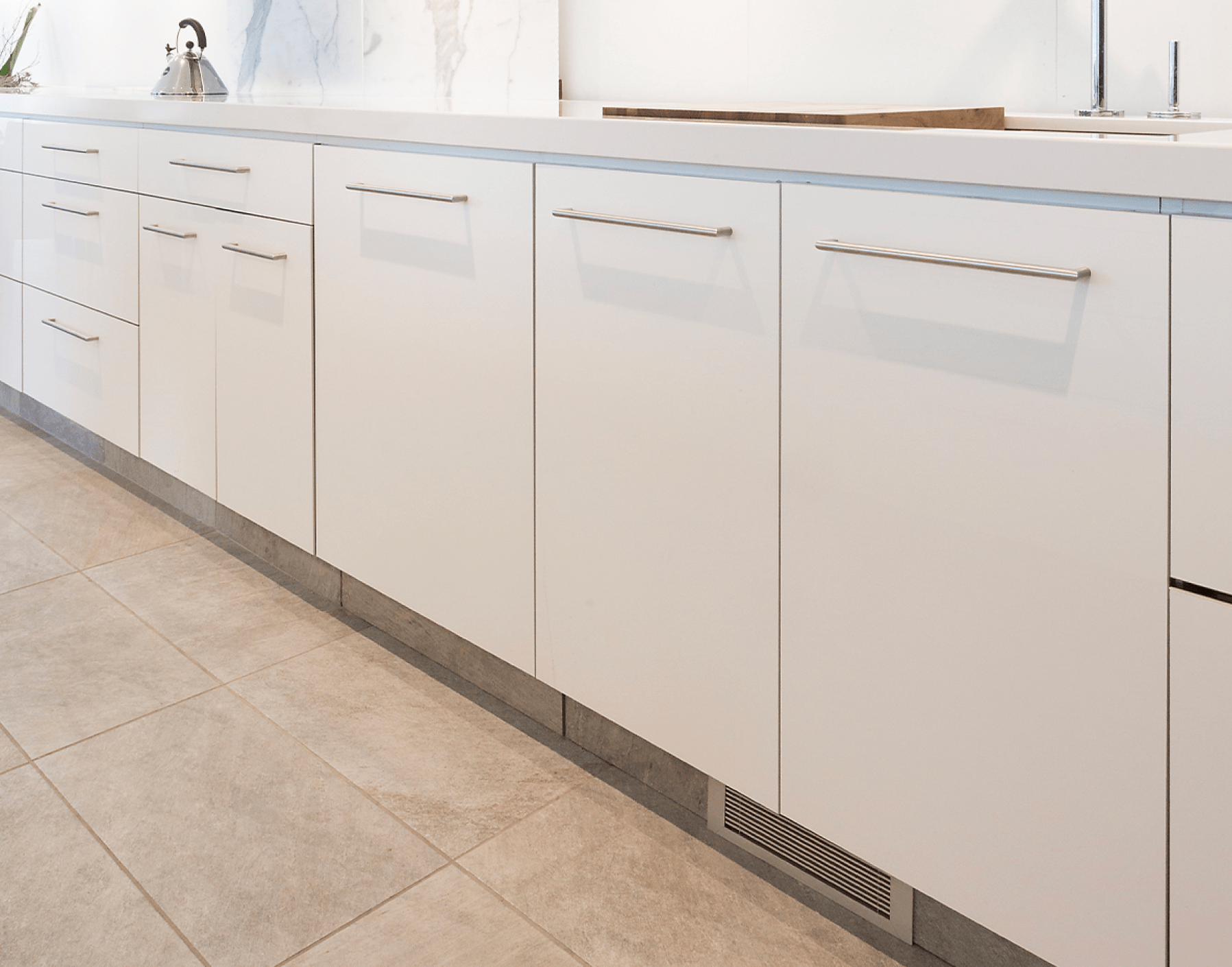 vent covers brushed chrome toekick modern white kitchen by kul grilles