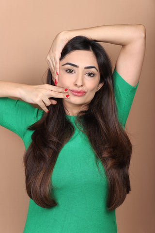 Face Yoga with India's best Certified Expert Vibhuti Arora from House of Beauty & Face Yoga School, get beautiful and glowing skin, reduce facial fat with Guasha & Jade Roller today! A girl with a Face Yoga pose Free Image