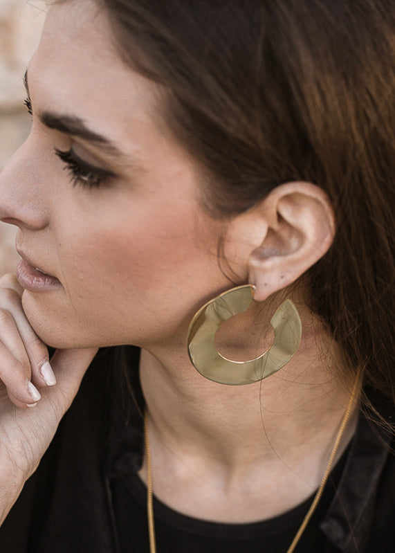 close-up model, with brook earrings-gold