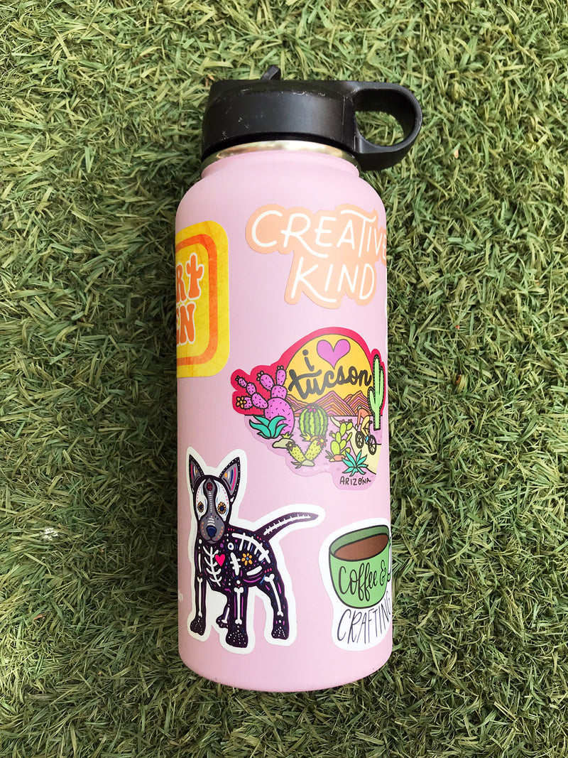 light pink hydro flask with stickers