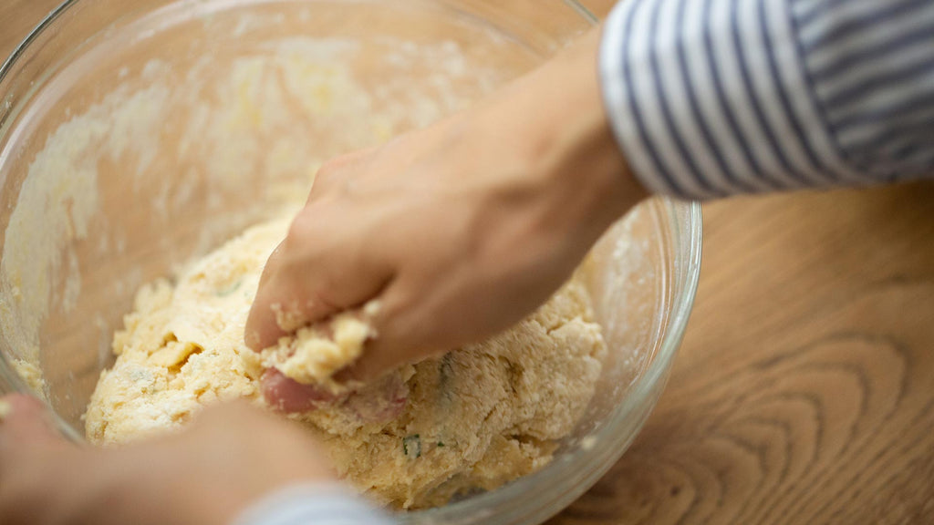 Kneading dough for rosemary scones